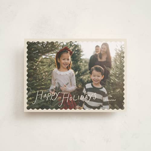 This is a cream petite holiday cards with standard by Pixel and Hank called waved printing on signature in petite