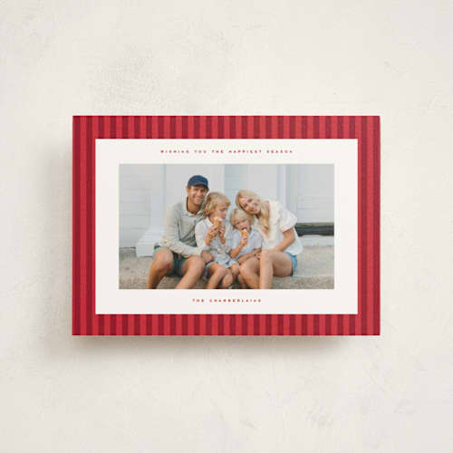 This is a poinsettia petite holiday cards with standard by Wildfield Paper Co called poinsettia stripe printing on signature in petite