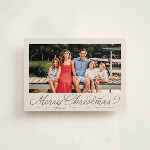 This is a fir christmas postcards with standard by Everett Paper Goods called classically printing on signature in postcard