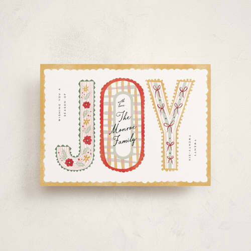 This is a butter christmas postcards with standard by Pixel and Hank called joy ribbon printing on signature in postcard