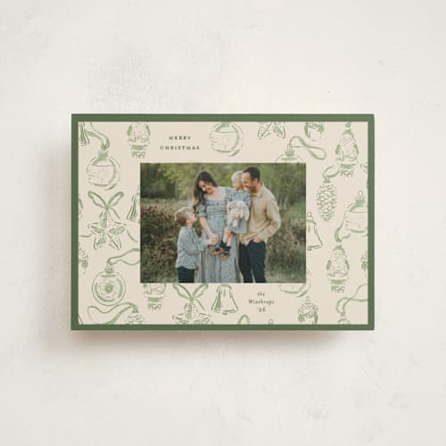 This is a pine christmas postcards with standard by Corinne Malesic called ornament collection printing on signature in postcard