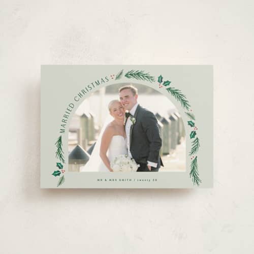 This is a sage christmas postcards with standard by Hooray Creative called a married christmas printing on signature in postcard