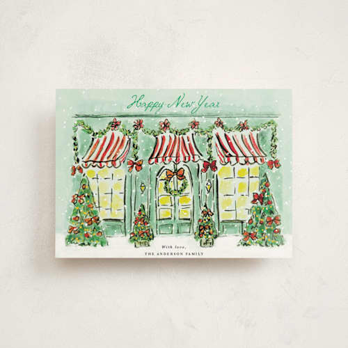 This is a frosted mint christmas postcards with standard by Cass Loh called the jolly storefront printing on signature in postcard