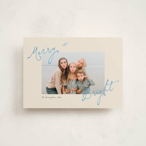 This is a electric blue christmas postcards with standard by Morgan Kendall called topsy turvy printing on signature in postcard