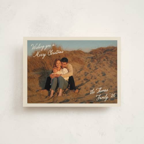 This is a cream christmas postcards with standard by Robert and Stella called postcard christmas printing on signature in postcard