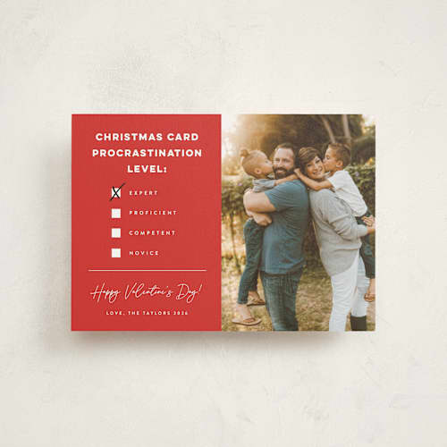 This is a poinsettia valentine postcards with standard by Erica Krystek called procrastination expert printing on signature in postcard
