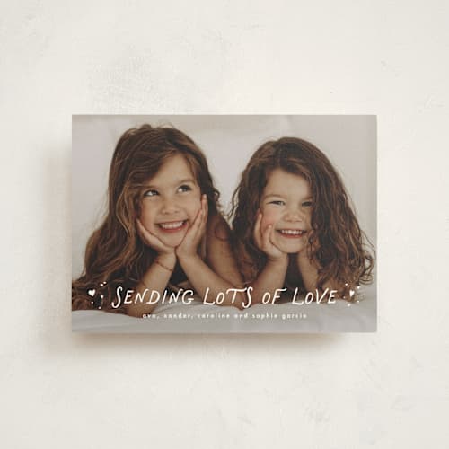 This is a cloud valentine postcards with standard by Lea Delaveris called sending lots of love printing on signature in postcard