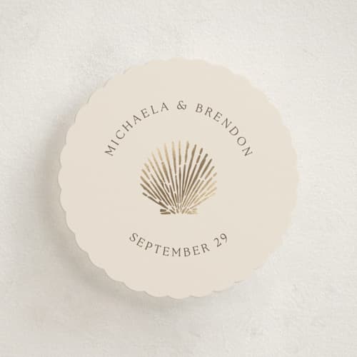 This is a champagne enclosure cards with foil pressed by Griffinbell Paper Co. called seaside printing on signature in mini