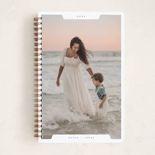 This is a snow journals with standard by Gwen Bedat called holiday file printing on premium cover stock in notebook