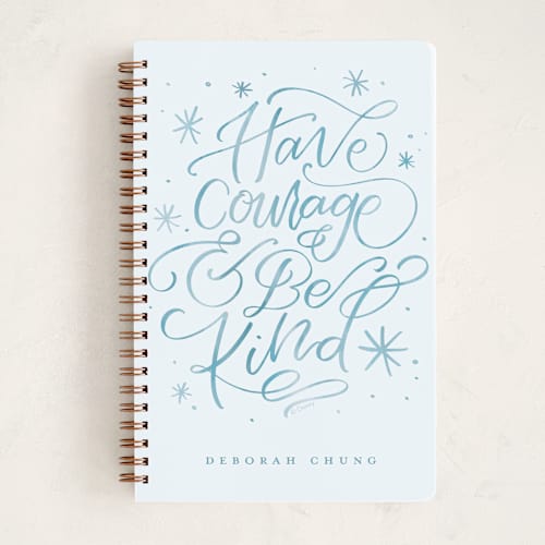 This is a glass slipper journals with standard by Amy Payne called disney's cinderella courage and kindness printing on premium cover stock in notebook