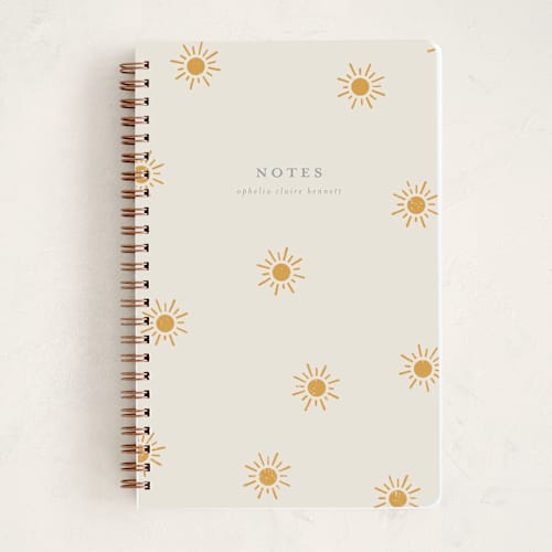This is a golden sun journals with standard by Meggy Masters called sun toss printing on premium cover stock in notebook
