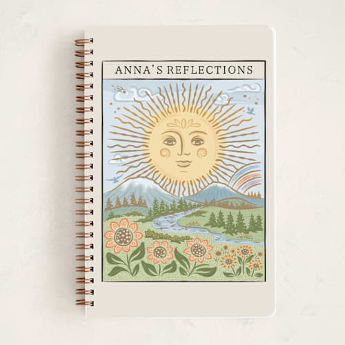 This is a tan journals with standard by Paper Sun Studio called golden sun tarot birthday card printing on premium cover stock in notebook
