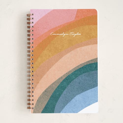 This is a unicorn journals with standard by Carrie Moradi called rainbow collage printing on premium cover stock in notebook