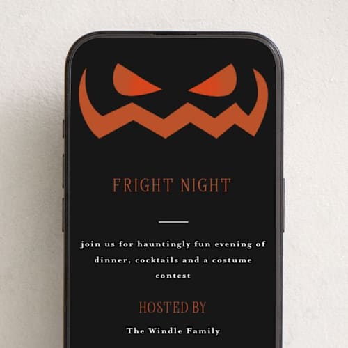 This is a pumpkin online invitations by Angela Garrick called spooky jack-o-lantern printing on digital paper in standard