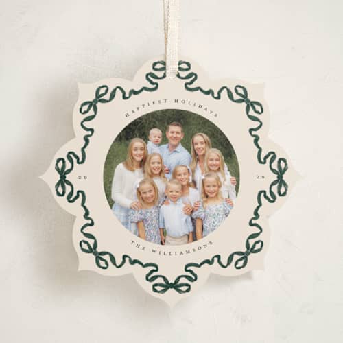 This is a pine needle holiday card ornaments with standard by Jenna Holcomb called bow ornament printing on recycled smooth signature in ornament