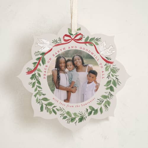 This is a sleigh holiday card ornaments with standard by Everett Paper Goods called wreath of doves printing on recycled smooth signature in ornament