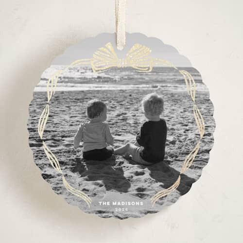 This is a starlight holiday card ornaments with foil pressed by Pink House Press called bow frame printing on recycled smooth signature in ornament