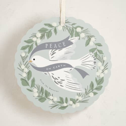 This is a ice holiday card ornaments with standard by Everett Paper Goods called dove wreath printing on signature in ornament