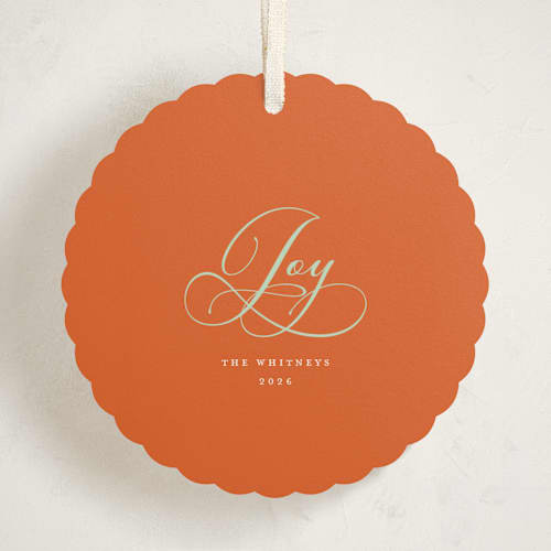 This is a tangerine holiday card ornaments with standard by Erika Firm called joy cloud printing on signature in ornament