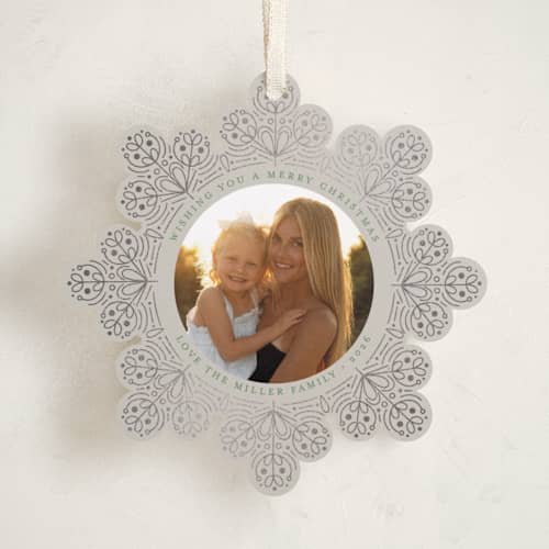 This is a snowfall holiday card ornaments with foil pressed by Amy Payne called scandinavian snowflake printing on recycled smooth signature in ornament