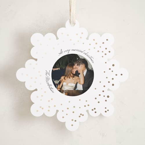 This is a snow holiday card ornaments with foil pressed by Anna Kasper called a very married christmas foil ornament printing on recycled smooth signature in ornament