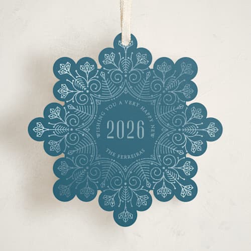 This is a ice holiday card ornaments with foil pressed by Ana de Sousa called christmas snowflake printing on signature in ornament