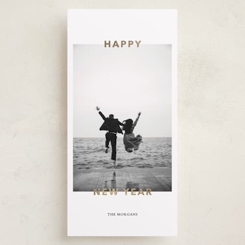 This is a cloud foil pressed holiday cards with foil pressed by Angela Thompson called happy! printing on recycled smooth signature in tall