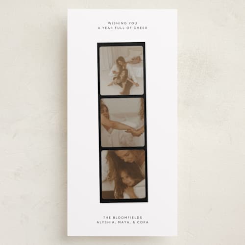 This is a coal holiday photo cards with standard by taylorVdesign called holiday highlight reel printing on recycled smooth signature in tall