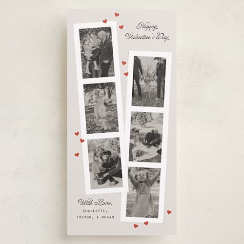 This is a vanilla holiday photo cards with standard by Heather Schertzer called film strip printing on recycled smooth signature in tall