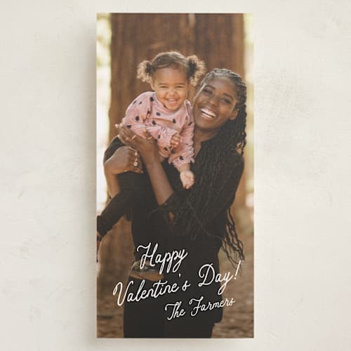 This is a cotton holiday photo cards with standard by Stacey Meacham called enchanting script printing on recycled smooth signature in tall