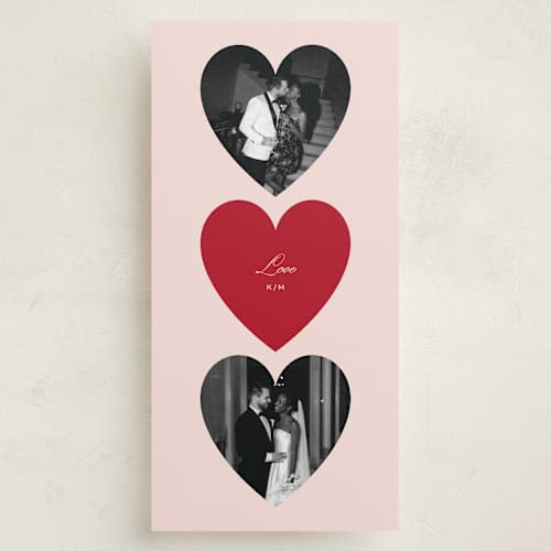 This is a blush holiday photo cards with standard by Jennifer Lew called trois heart printing on recycled smooth signature in tall
