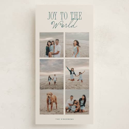 This is a teal holiday photo cards with standard by Corinne Malesic called cross printing on recycled smooth signature in tall