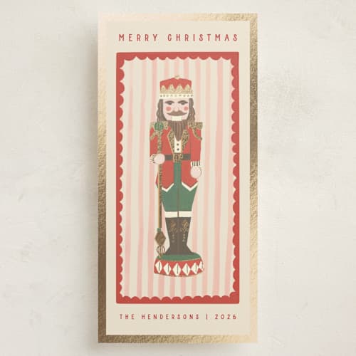 This is a poinsettia foil pressed holiday cards with foil pressed by Teju Reval called gilded nutcracker printing on signature in tall