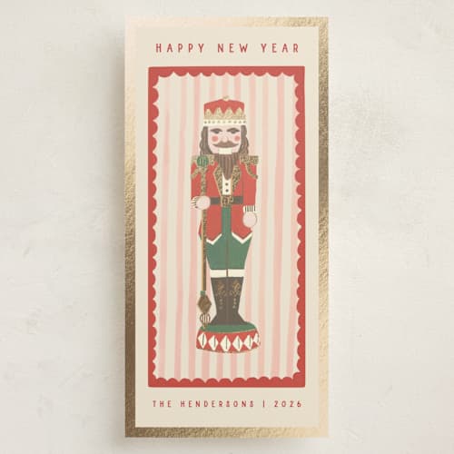 This is a poinsettia foil pressed holiday cards with foil pressed by Teju Reval called gilded nutcracker printing on signature in tall