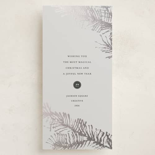 This is a frost foil pressed holiday cards with foil pressed by Sumak Studio called painted spruce printing on signature in tall
