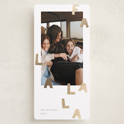 This is a snow foil pressed holiday cards with foil pressed by Sumak Studio called fa la la la printing on recycled smooth signature in tall