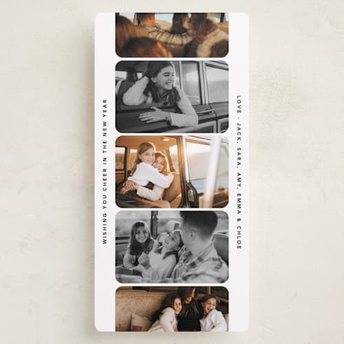 This is a snowflake holiday photo cards with standard by Creo Study called vintage photostrip printing on recycled smooth signature in tall