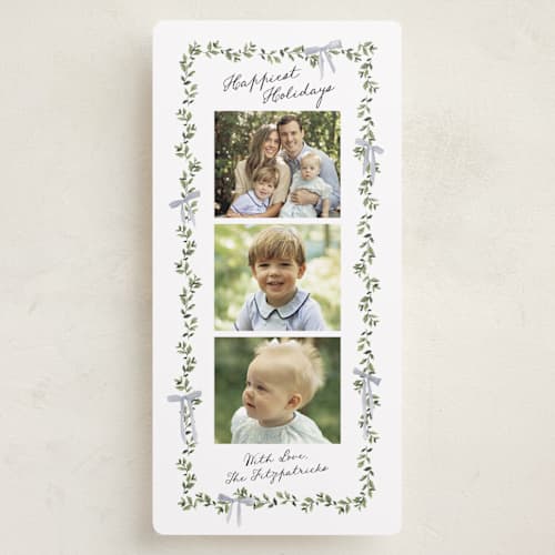 This is a pond holiday photo cards with standard by Everett Paper Goods called bow adorned garland printing on recycled smooth signature in tall
