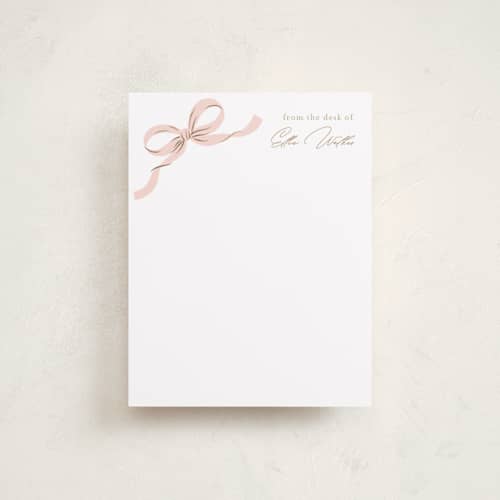 This is a blush foil stamped stationery with foil pressed by Paper Raven Co. called a little bow printing on signature in 4.25x5.5