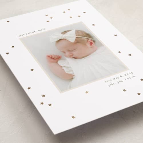 This is a north star foil stamped birth announcements with foil pressed by Ellen Schlegelmilch called twinkly stars printing on recycled smooth signature in standard