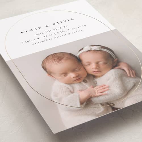 This is a cotton foil stamped birth announcements with foil pressed by Stacy Maalouf called oval announcement printing on recycled smooth signature in standard