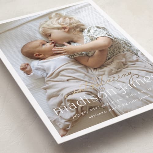 This is a sugar foil stamped birth announcements with foil pressed by Ashley Iwafuchi called loving welcome printing on recycled smooth signature in standard
