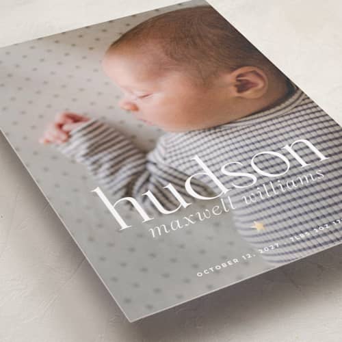 This is a cream foil stamped birth announcements with foil pressed by Vera Lim called tiny star printing on recycled smooth signature in standard