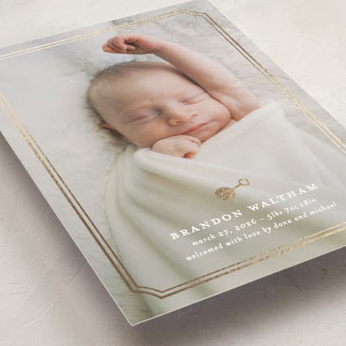 This is a snow foil stamped birth announcements with foil pressed by Creo Study called bevelled printing on recycled smooth signature in standard
