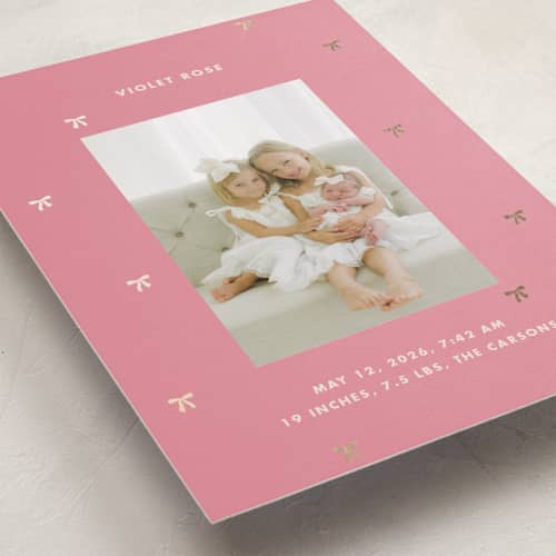 This is a bubblegum foil stamped birth announcements with foil pressed by Baumbirdy called embellished bows printing on recycled smooth signature in standard
