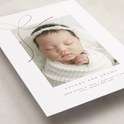 This is a sugar foil stamped birth announcements with foil pressed by Yuliya Evseeva called little bow printing on recycled smooth signature in standard