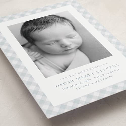 This is a sky birth announcements with standard by Lea Delaveris called checked printing on recycled smooth signature in standard