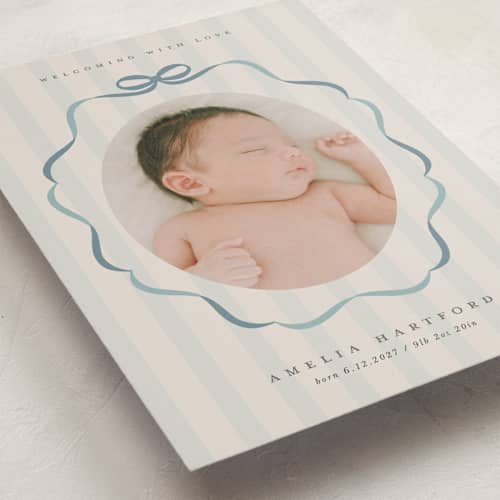 This is a lagoon birth announcements with standard by Lori Wemple called bows and stripes printing on recycled smooth signature in standard
