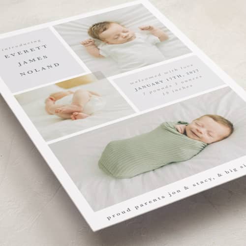 This is a dusty blue birth announcements with standard by Julie Murray called love multiplies printing on recycled smooth signature in standard