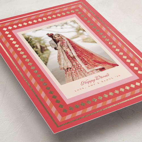 This is a cherry diwali cards with foil pressed by Teju Reval called gilded border printing on recycled smooth signature in standard